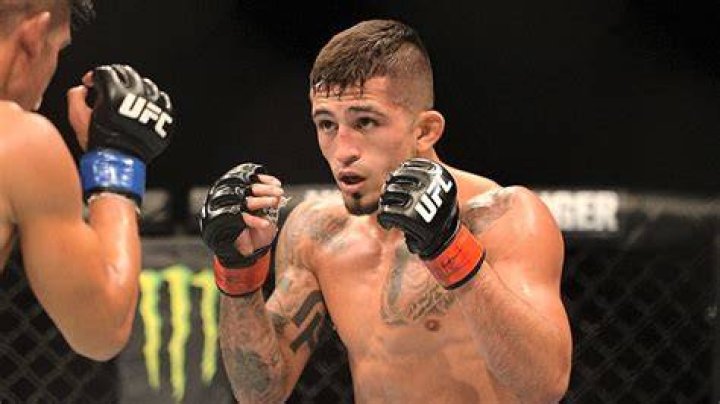
MMA Fighter Sergio Pettis And Longtime Girlfriend Carmen Lopez Are Engaged 